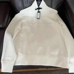 Genuine Tommy Hilfiger 1/4 zip. New with tags